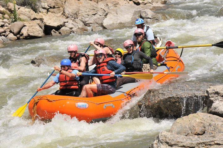 group rafting down rapids