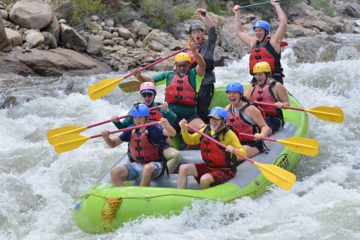 group rafting down rapids